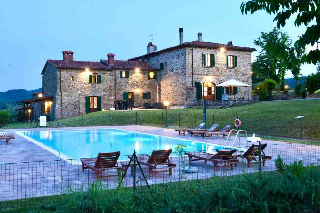 The swimming pool and terrace belonging to our rental apartments in Central Tuscany