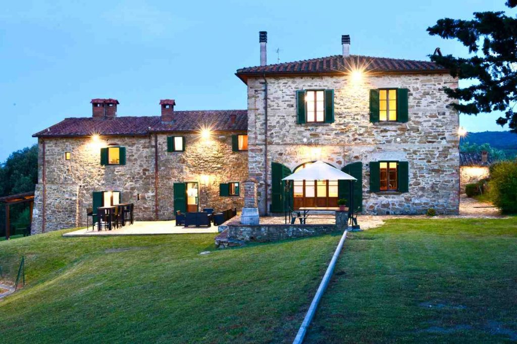 The old farmhouse with rental apartments in Central Tuscany has an outside deck area and bar