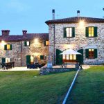 The old farmhouse with rental apartments in Central Tuscany has an outside deck area and bar